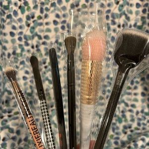 Sample makeup brushes, various brands and sizes.